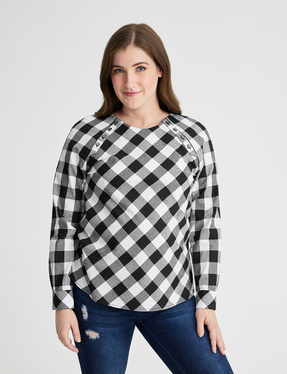 Chest port access blouse in black and white plaid, combining style with convenient medical functionality.