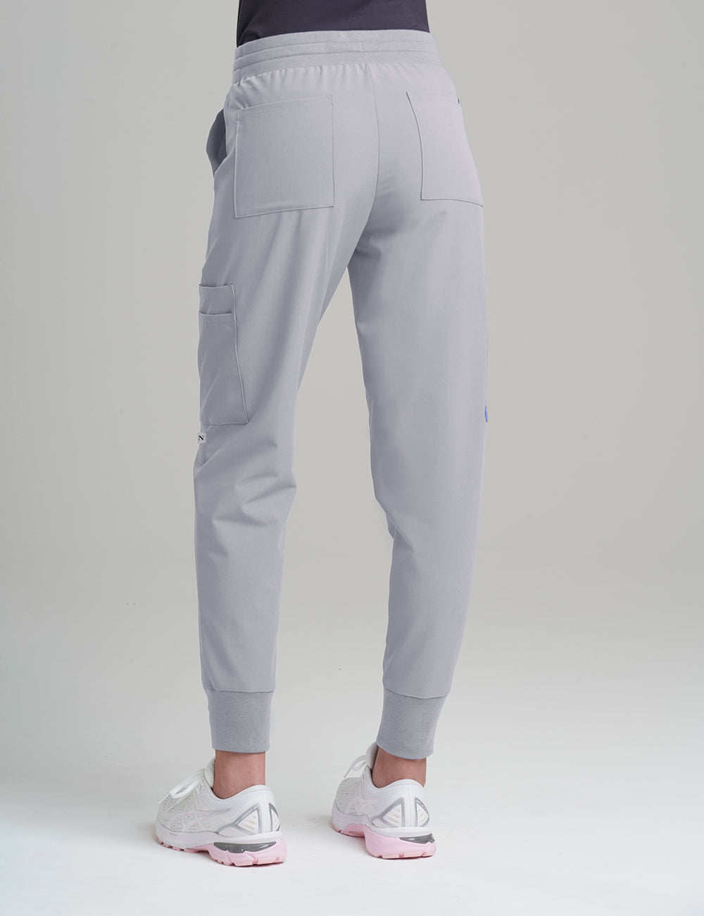 Professional women&#39;s jogger pants in ceil, designed with 12 practical pockets for convenience.