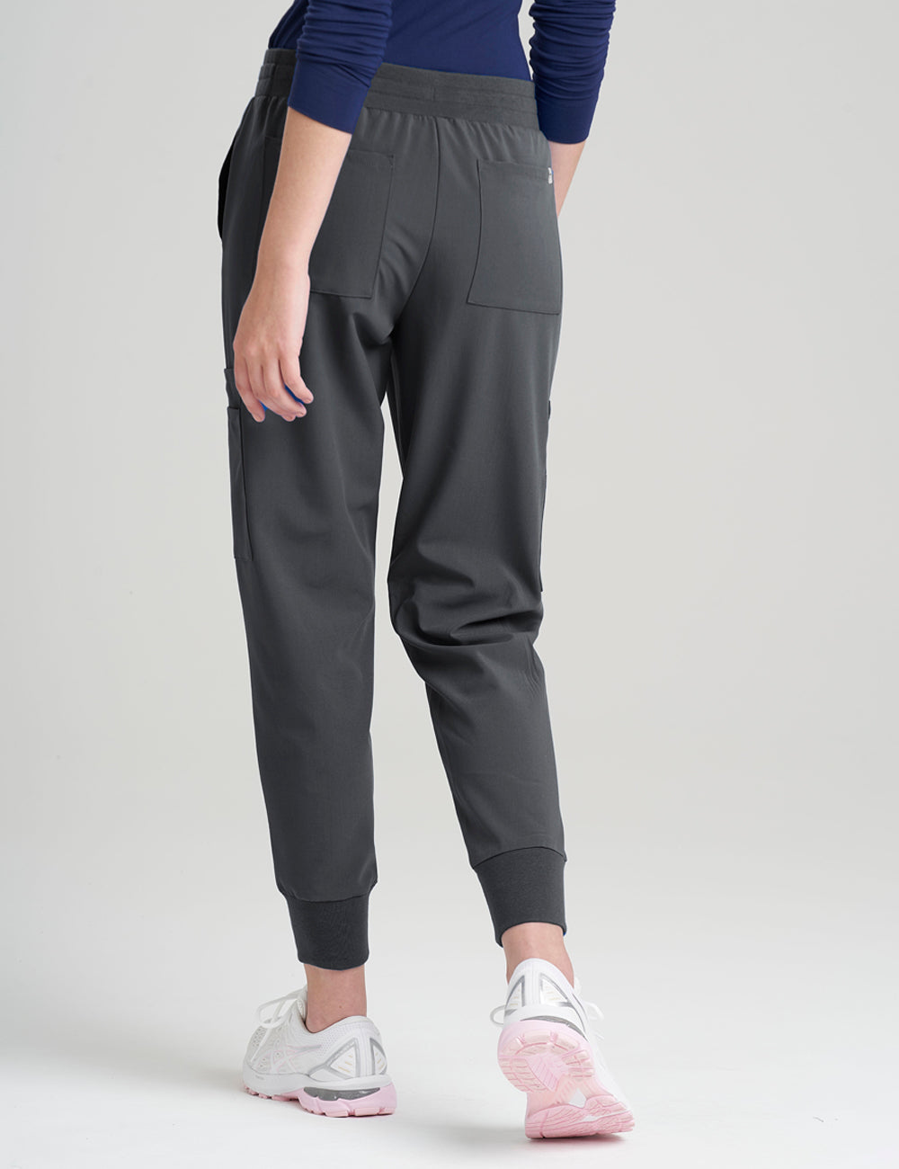 Durable stone gray scrub jogger pants for women, designed for comfort and functionality.