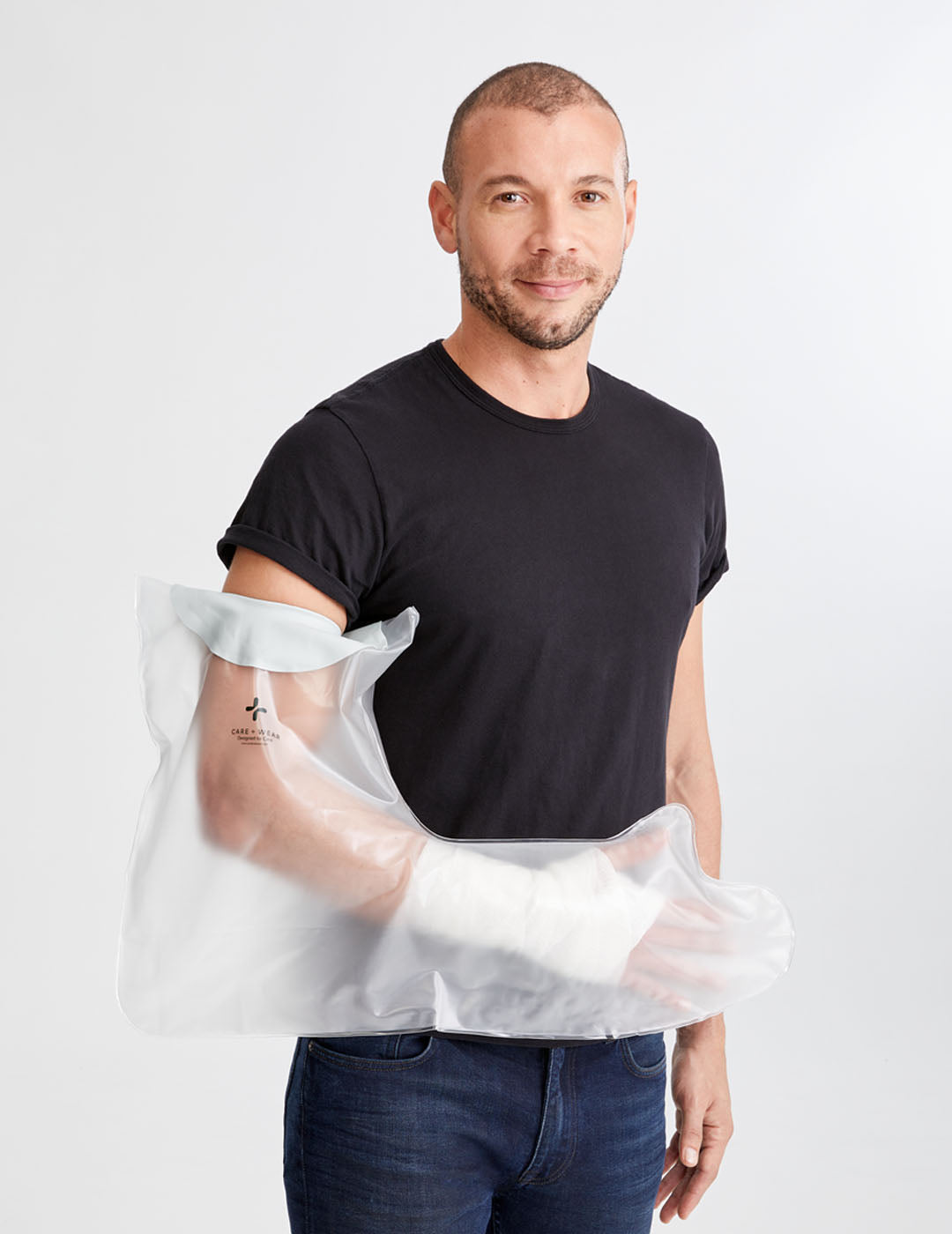 Waterproof shower cover designed for adults with a full arm cast, keeping the cast dry during bathing.