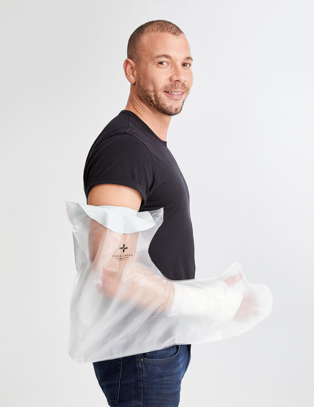 Waterproof shower cover designed for adults with a full arm cast, keeping the cast dry during bathing.
